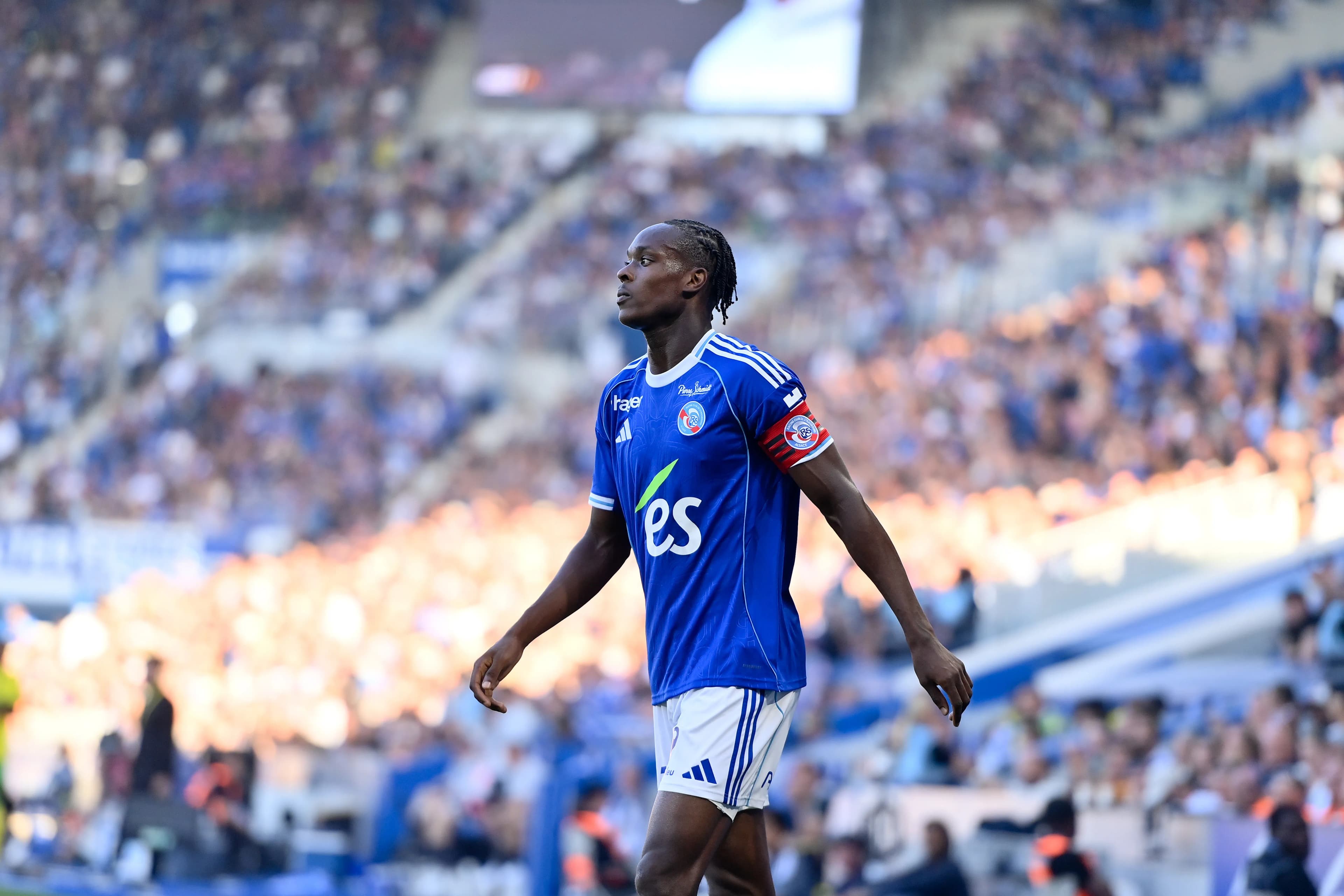 Emanuel Emegha leads Strasbourg on the pitch during their European qualification campaign