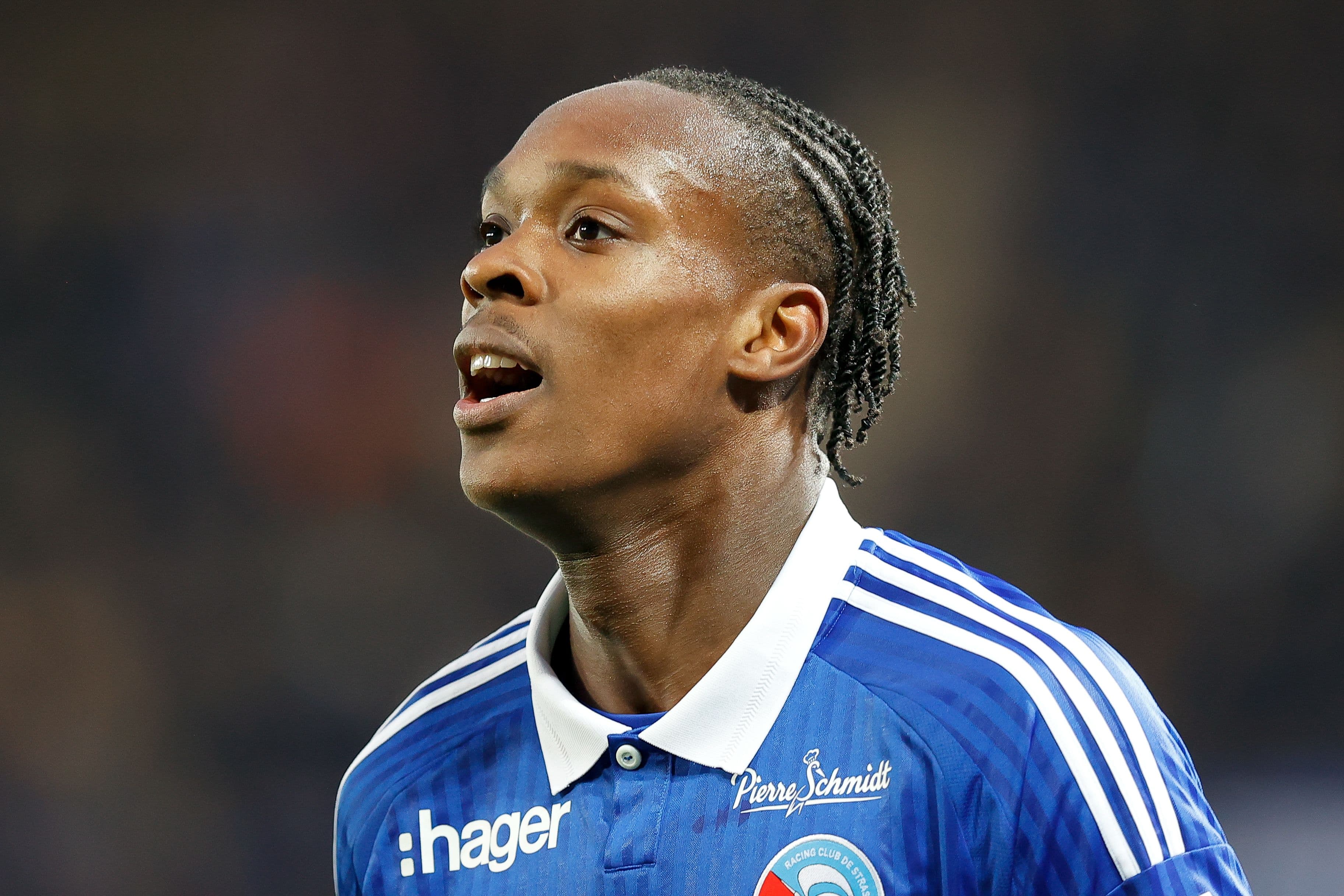Emanuel Emegha looks across the pitch in Strasbourg colours